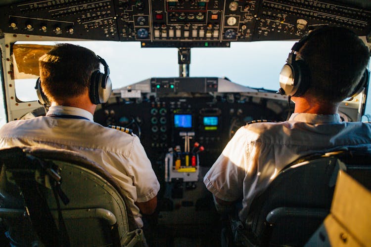 Two Pilots Flying An Airplane