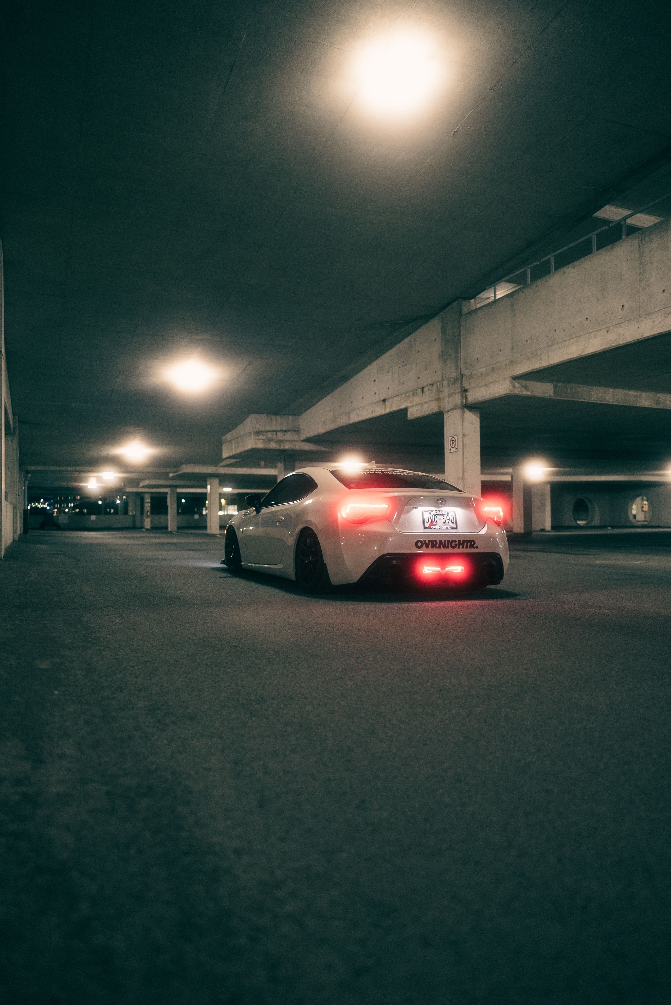 BMW Car Parked at Night in Urban Alleyway · Free Stock Photo