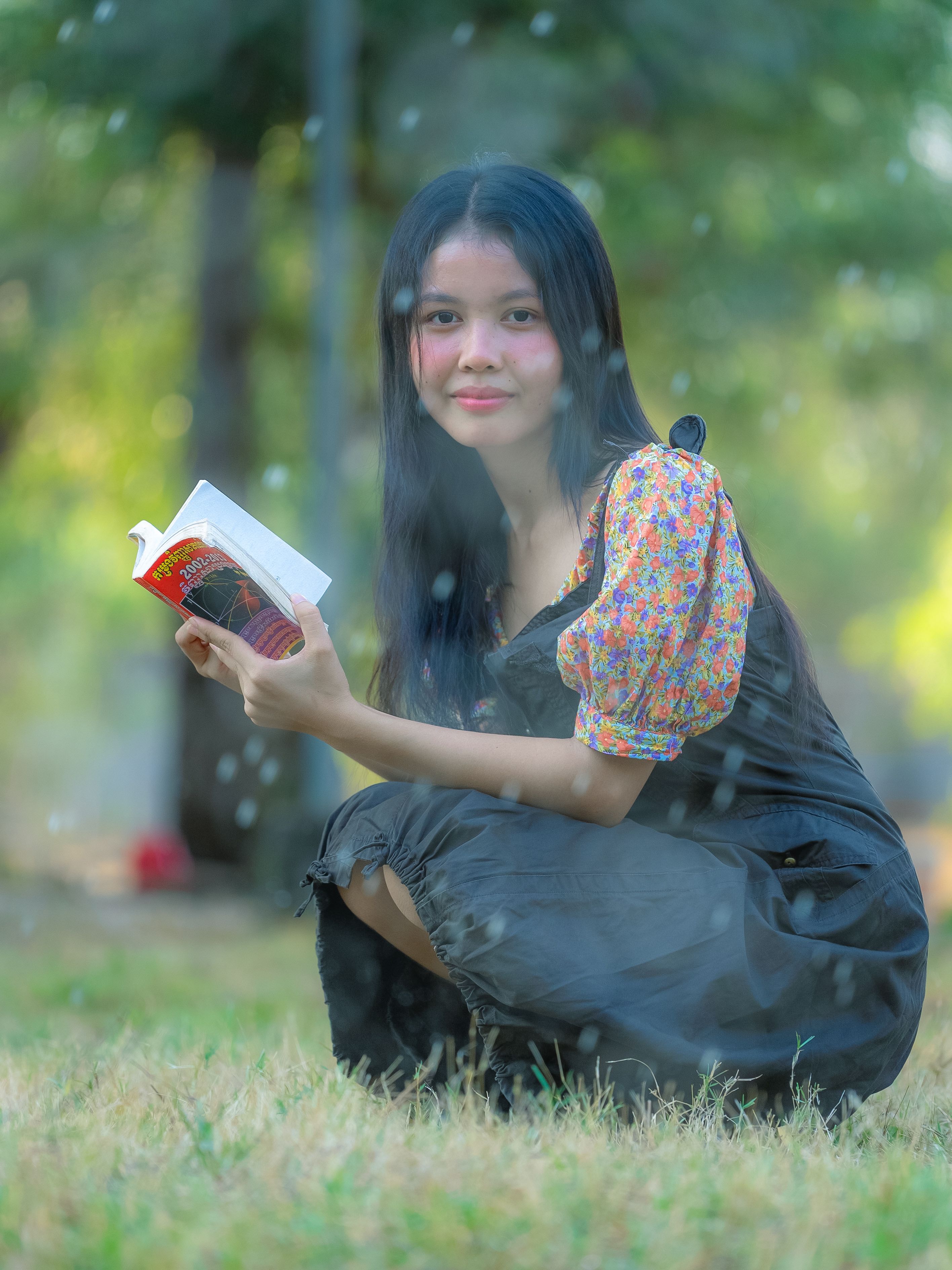 Woman in Black Hijab and Red Long Sleeve Shirt Reading a Book · Free ...