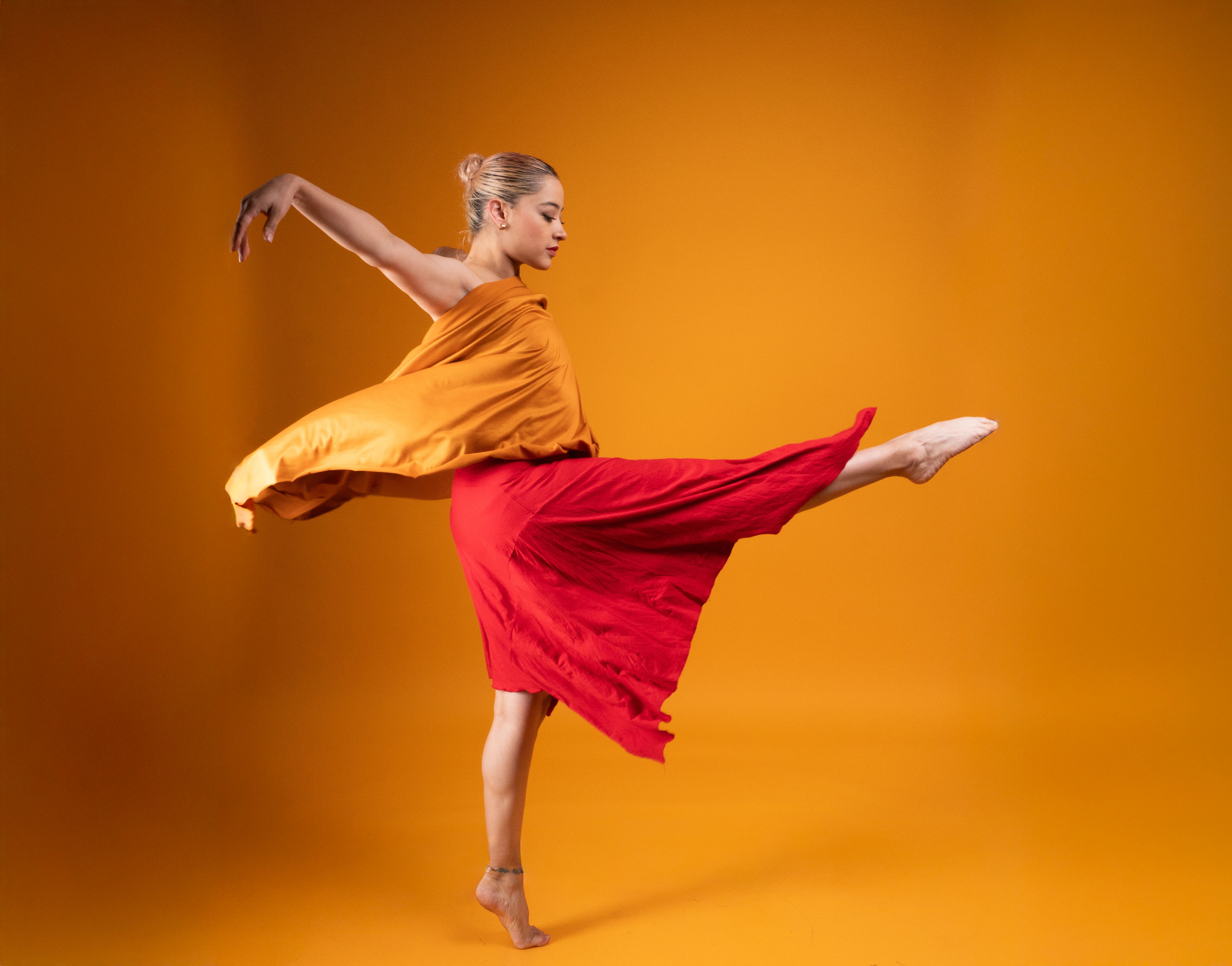 Contemporary Dance in Vibrant Studio Setting · Free Stock Photo