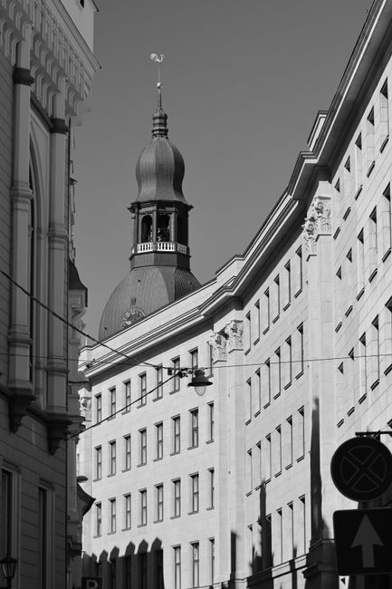 Black and white photo capturing the elegant architectural details of Riga's old city.