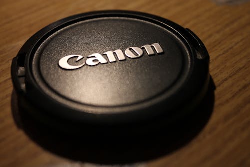 Zwarte Canon Cameralensdop