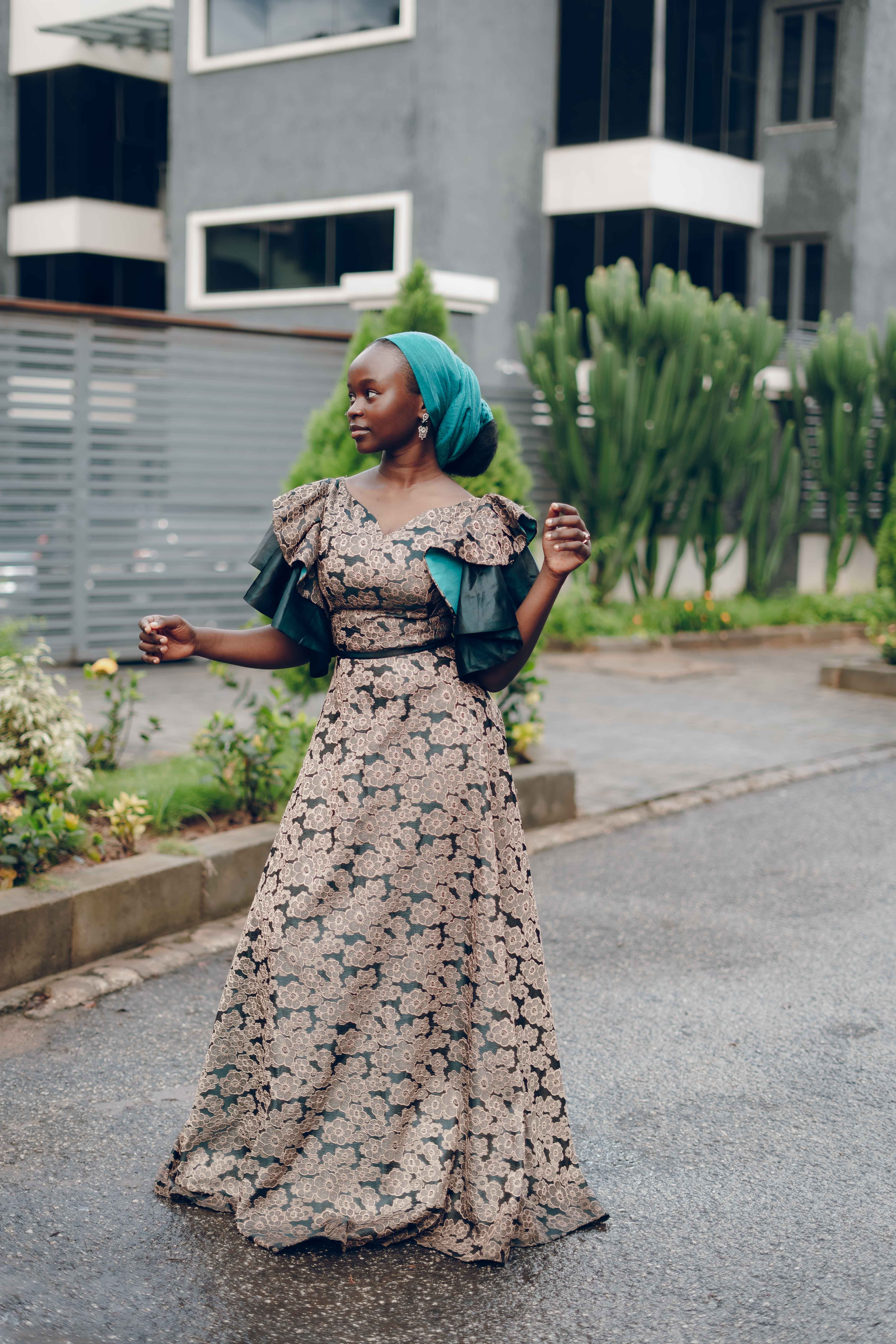 Elegant Nigerian Woman Outdoors in Traditional Dress  Free Stock Photo
