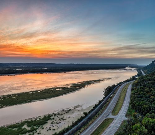 Free A breathtaking sunset over the Mississippi River in Minneiska, Minnesota, showcasing vibrant colors. Stock Photo