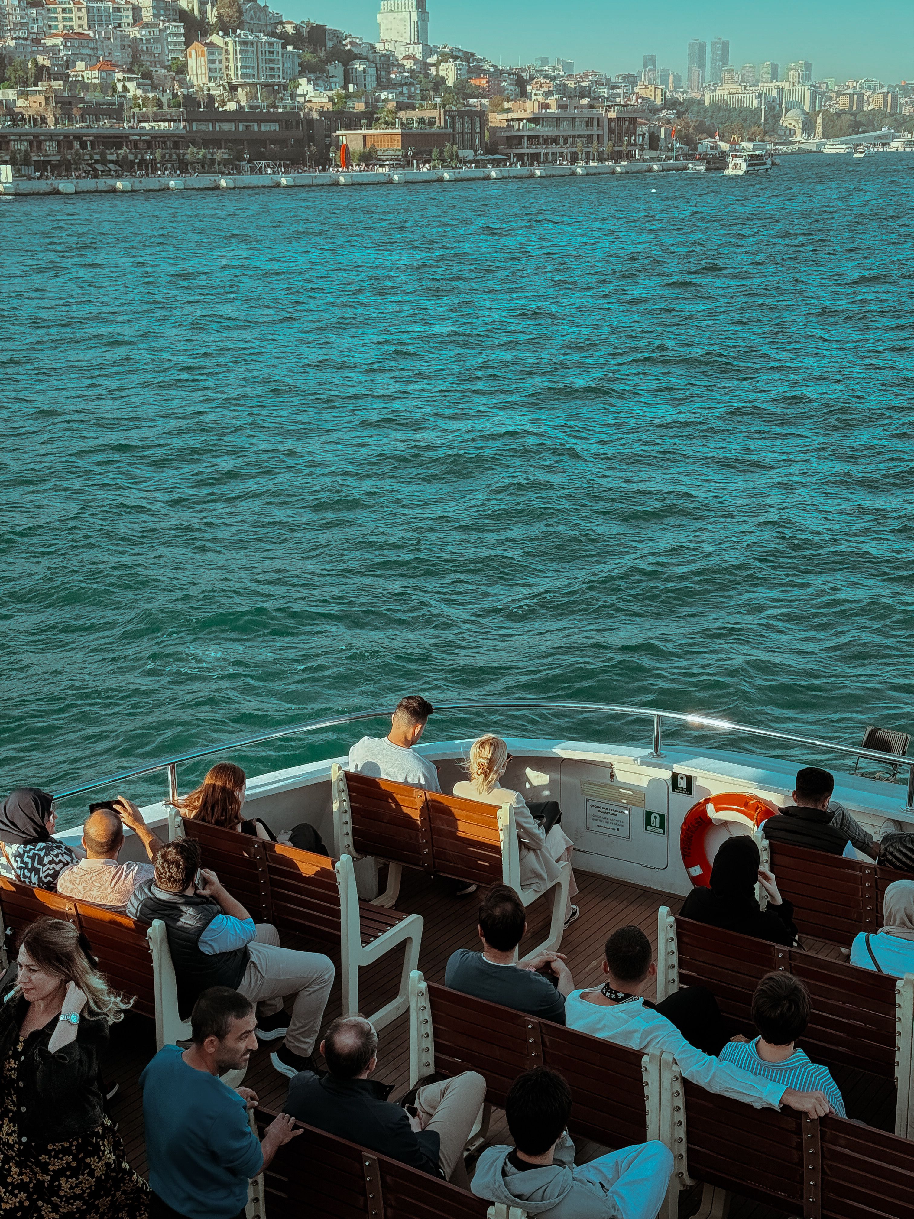 Scenic Boat Ride on Vibrant Turquoise Waters · Free Stock Photo