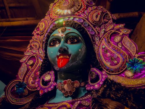 Free Vibrant statue of Hindu Goddess Kali adorned with elaborate decorations and intricate designs. Stock Photo