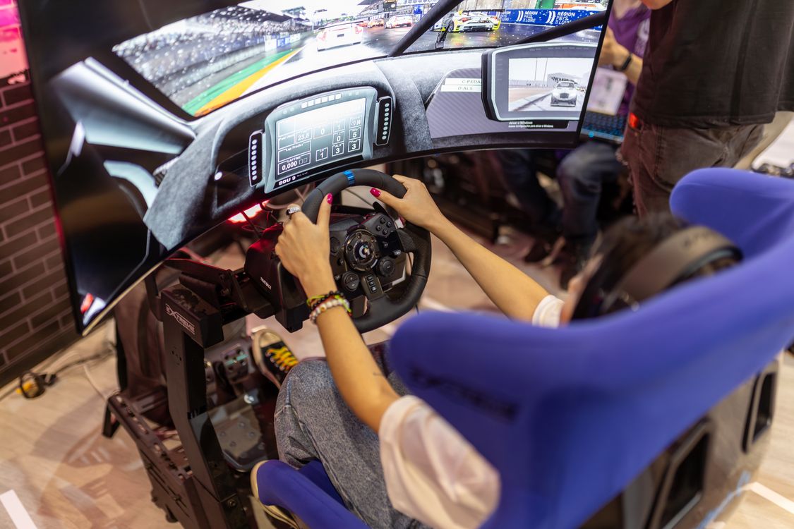 Realistic VR Racing Simulator Experience · Free Stock Photo
