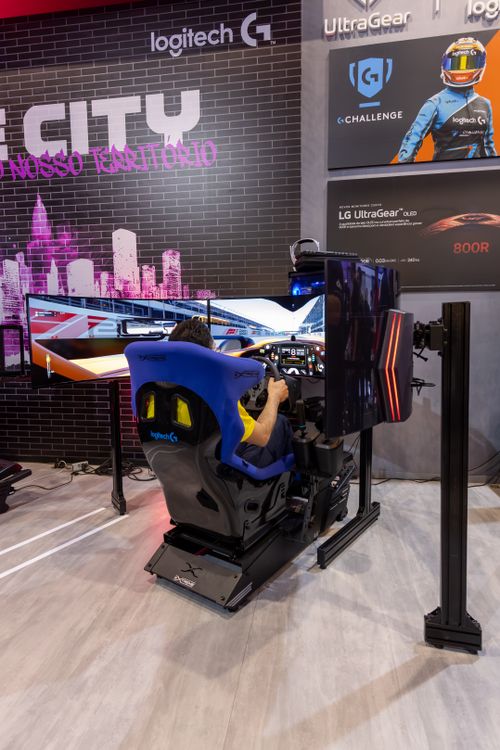 Immersive Racing Simulator at Gaming Event · Free Stock Photo