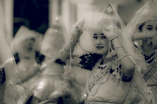 Free A group of women performing a traditional dance in Manipur, India, adorned in cultural attire. Stock Photo