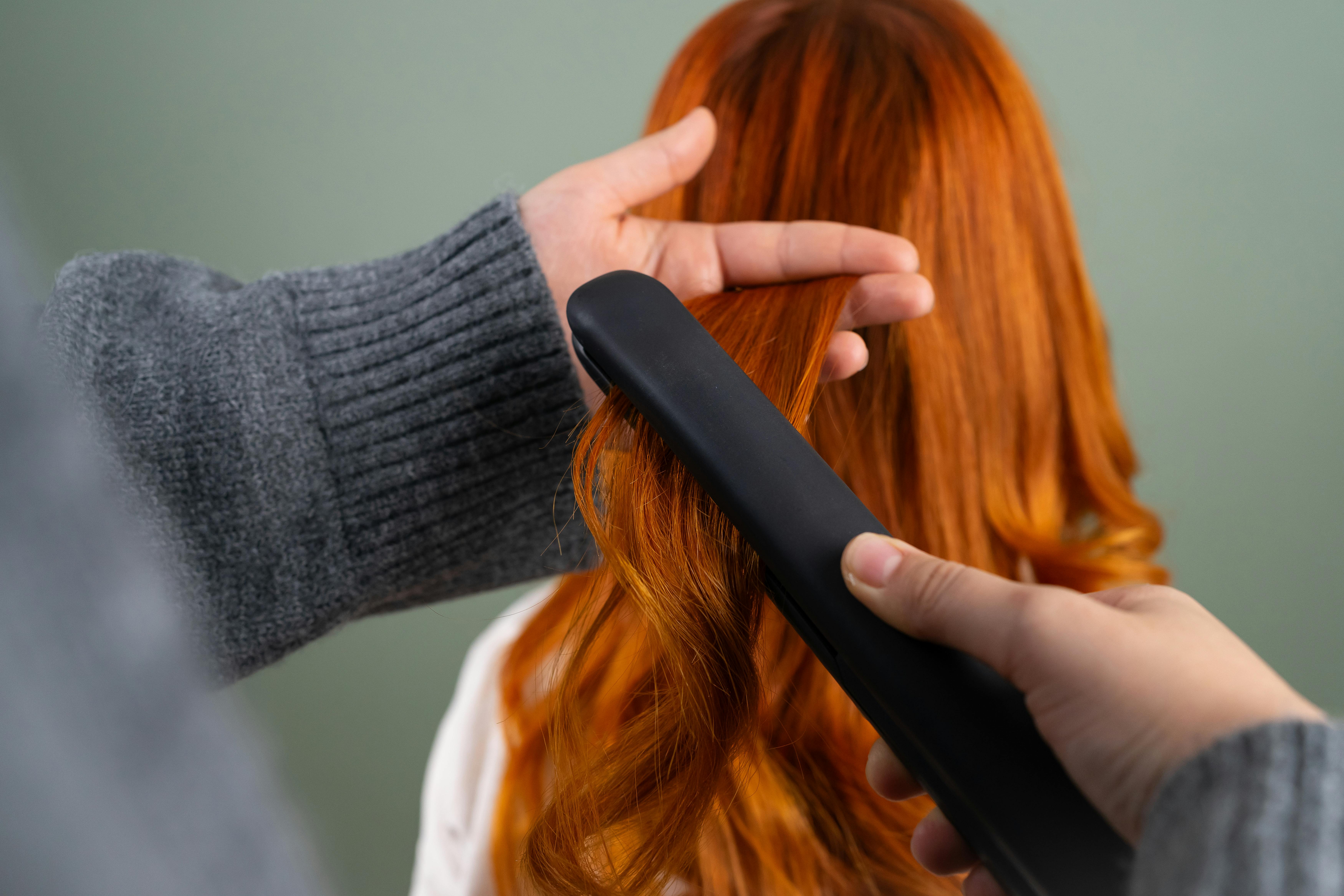 Styling Long Red Hair with Flat Iron Indoors