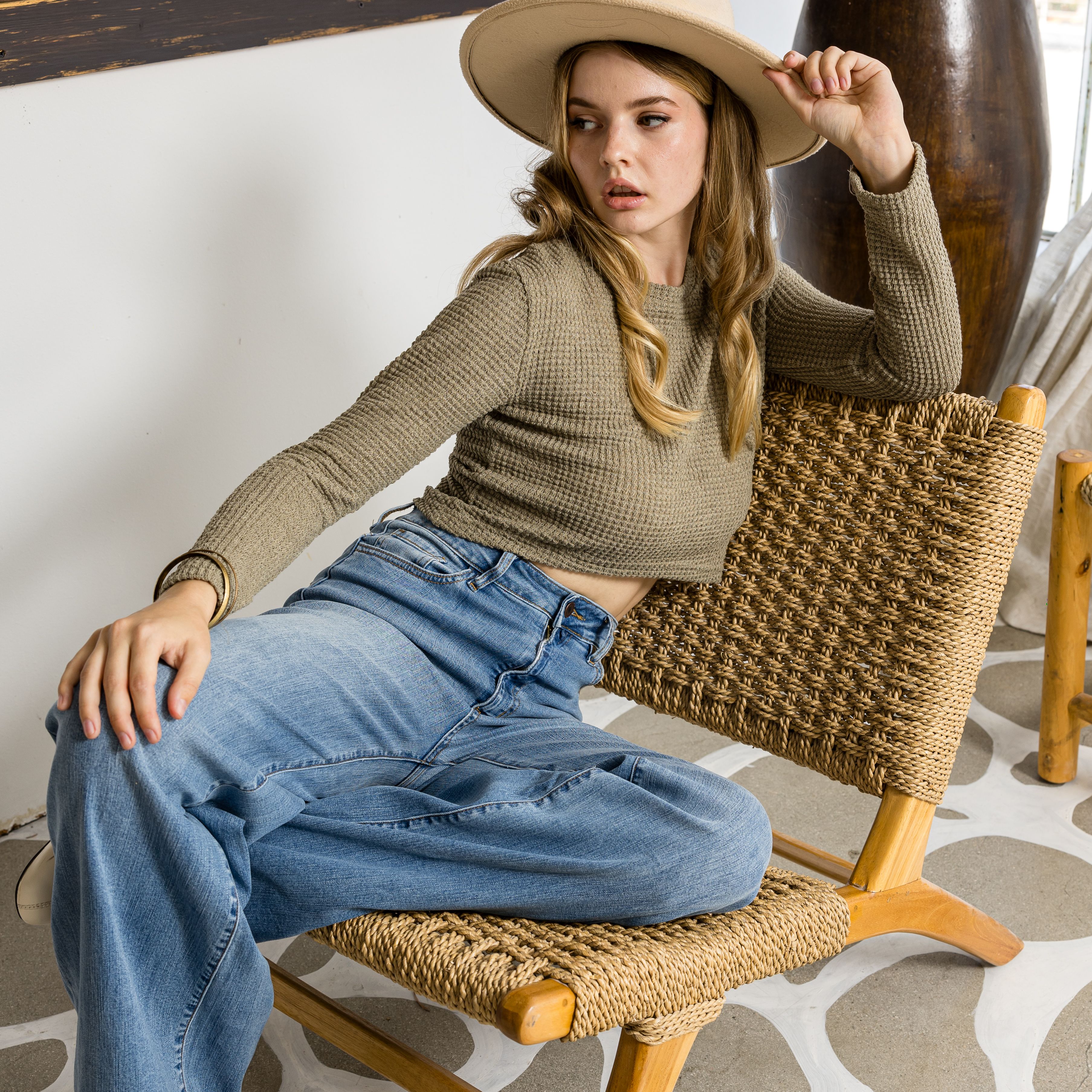 Fashionable Woman Posing in Modern Chair Indoors
