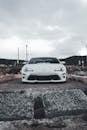 Sleek White Sports Car on an Overcast Day