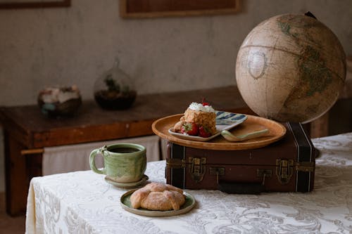 Free A rustic Chiapas breakfast setting with artisanal ceramics and globe. Stock Photo