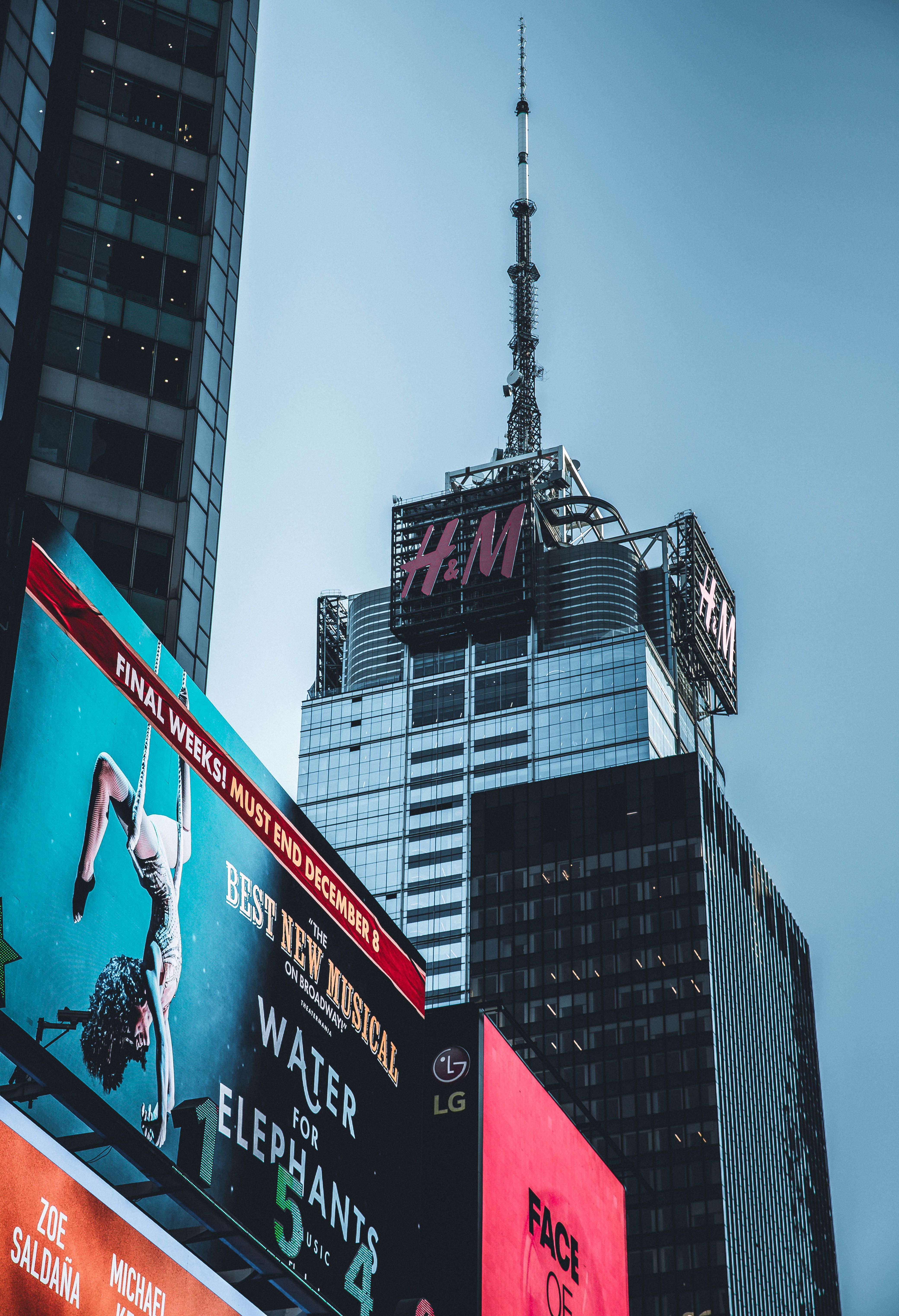 Dynamic view of Times Square with towering billboards and skyscrapers in New York City.
