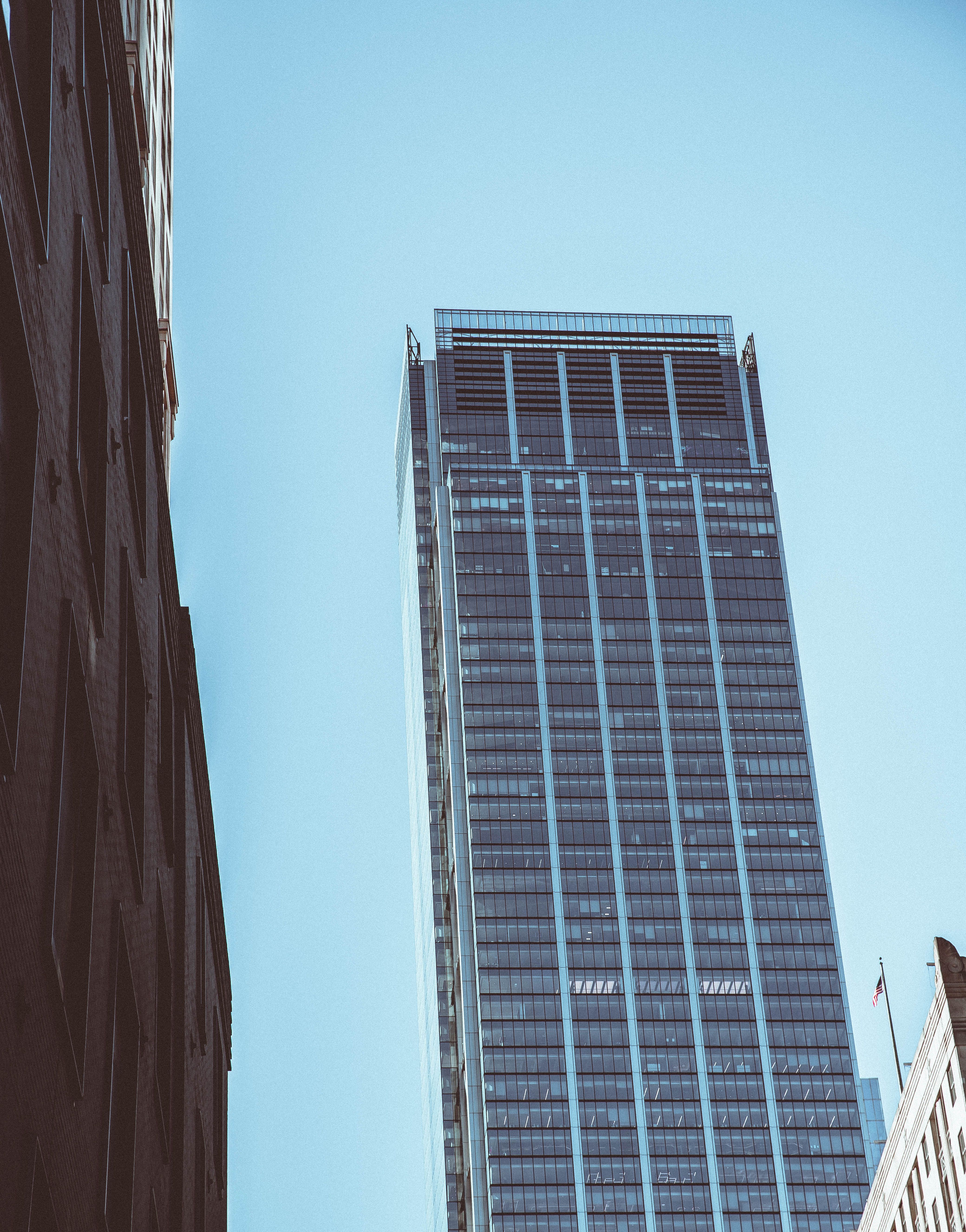 Skyscraper against Clear Blue Sky in NYC · Free Stock Photo