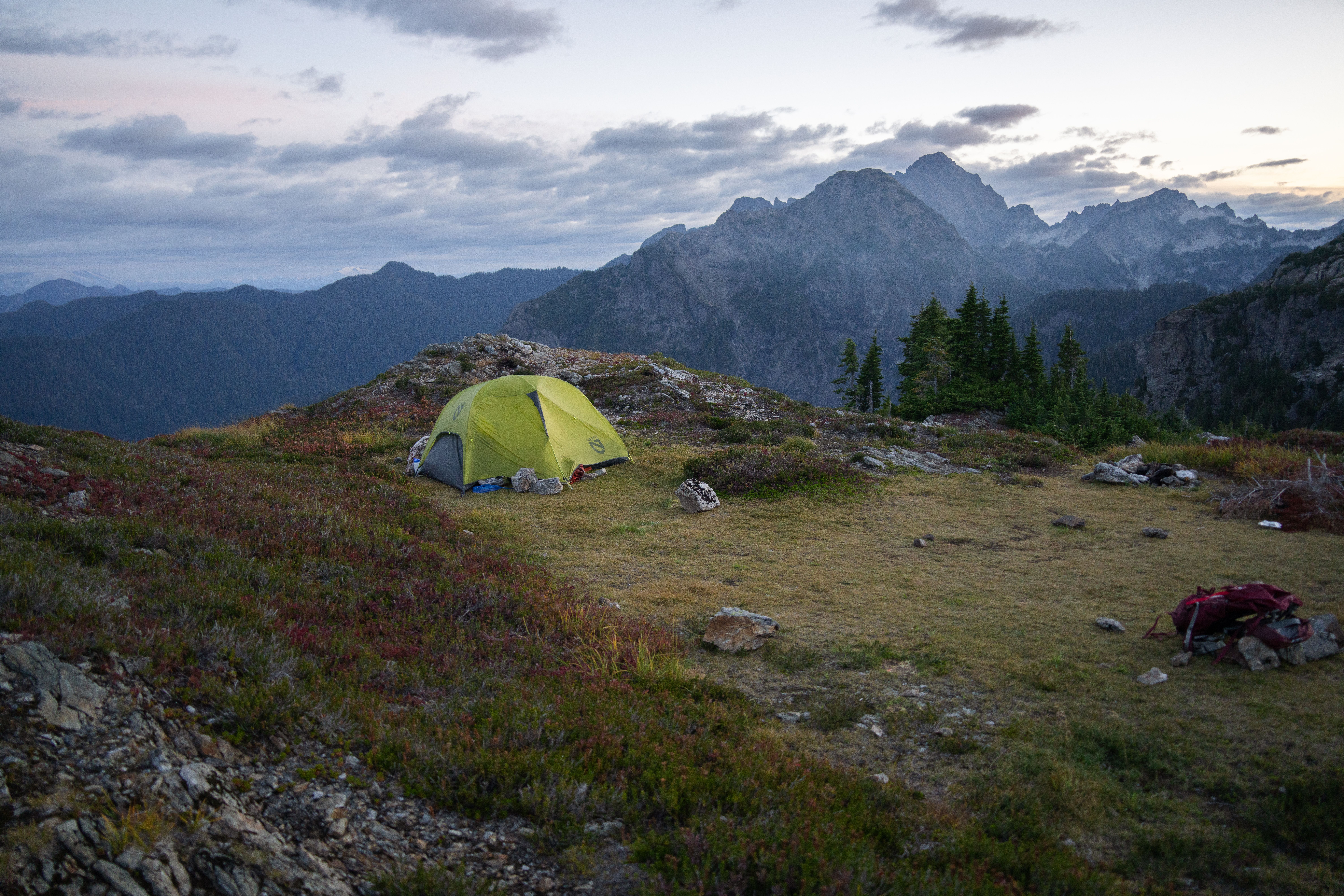 A rock-walled alpine tent site high in the North Cascades