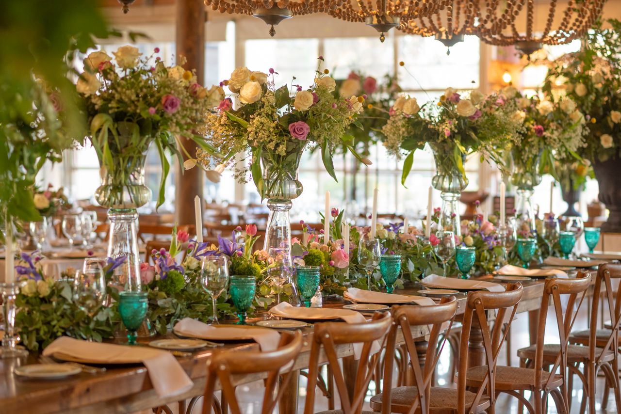 beautifully decorated wedding table with vibrant floral centerpieces a