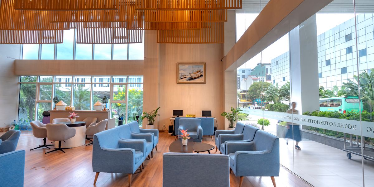 Bright modern hotel lobby with stylish seating and natural light