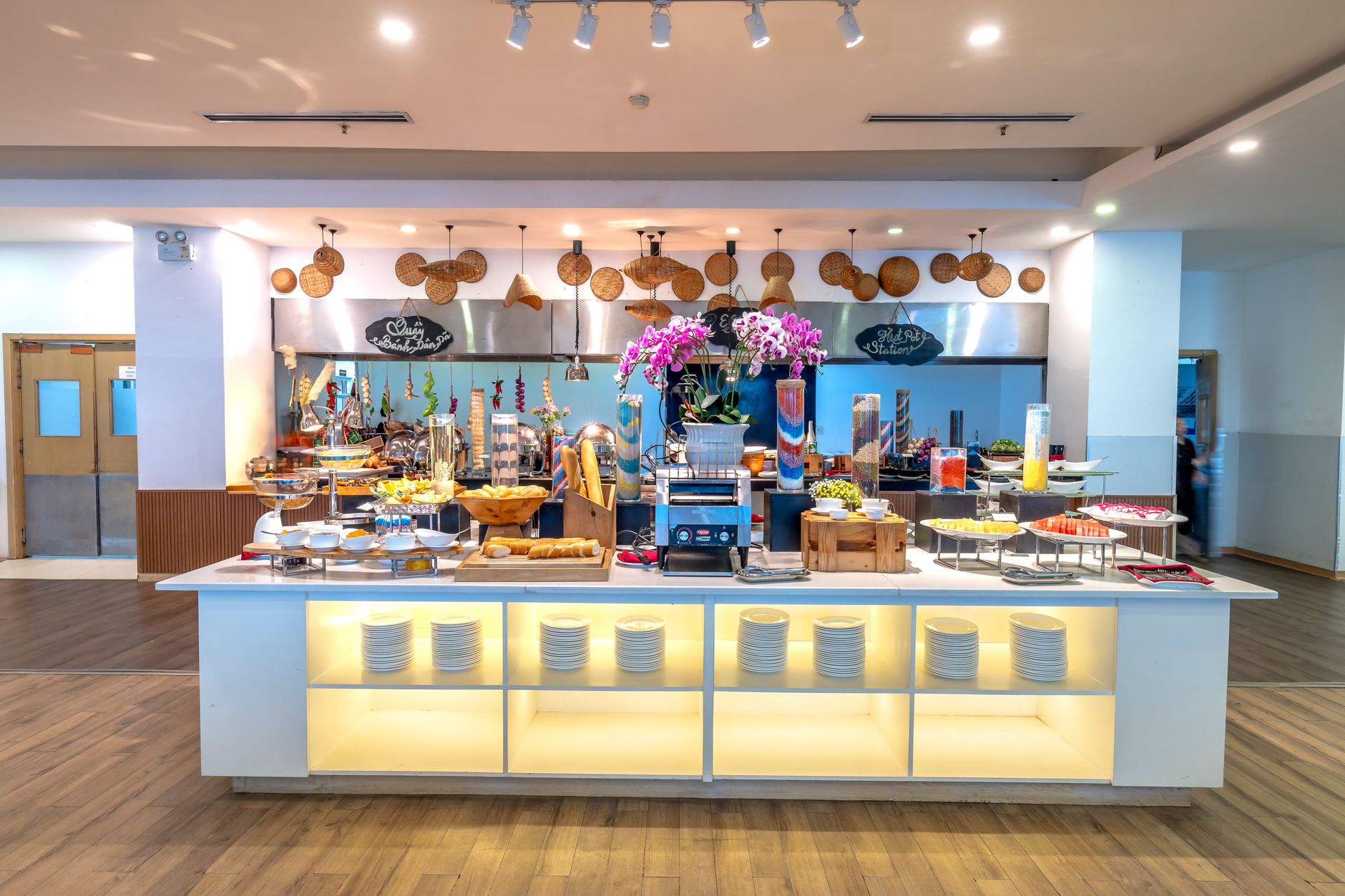 Vibrant buffet with diverse dishes in a modern, well-lit restaurant setting. Ideal for food and lifestyle images.