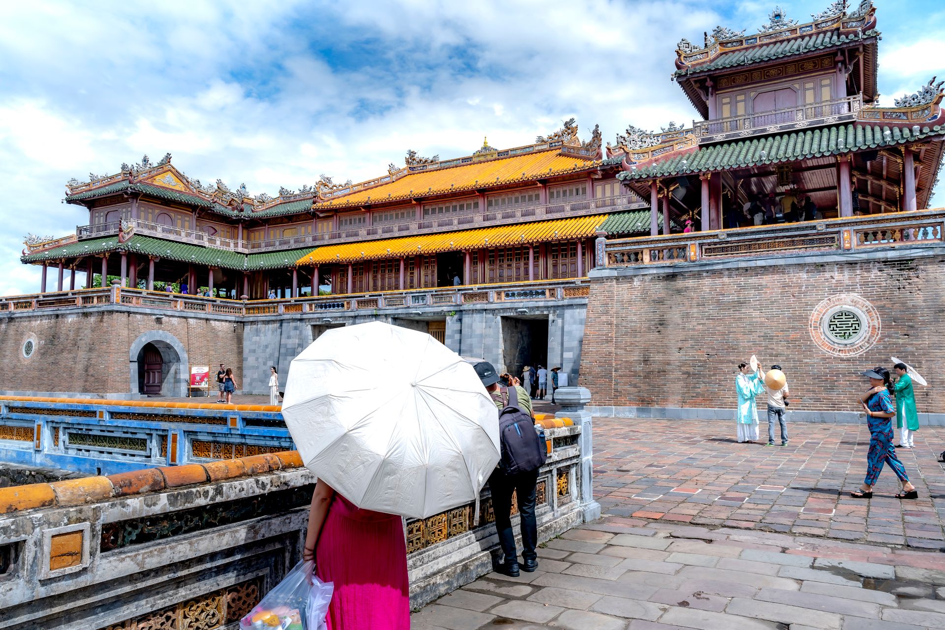 Tourists Exploring the Imperial City of Hue, Vietnam