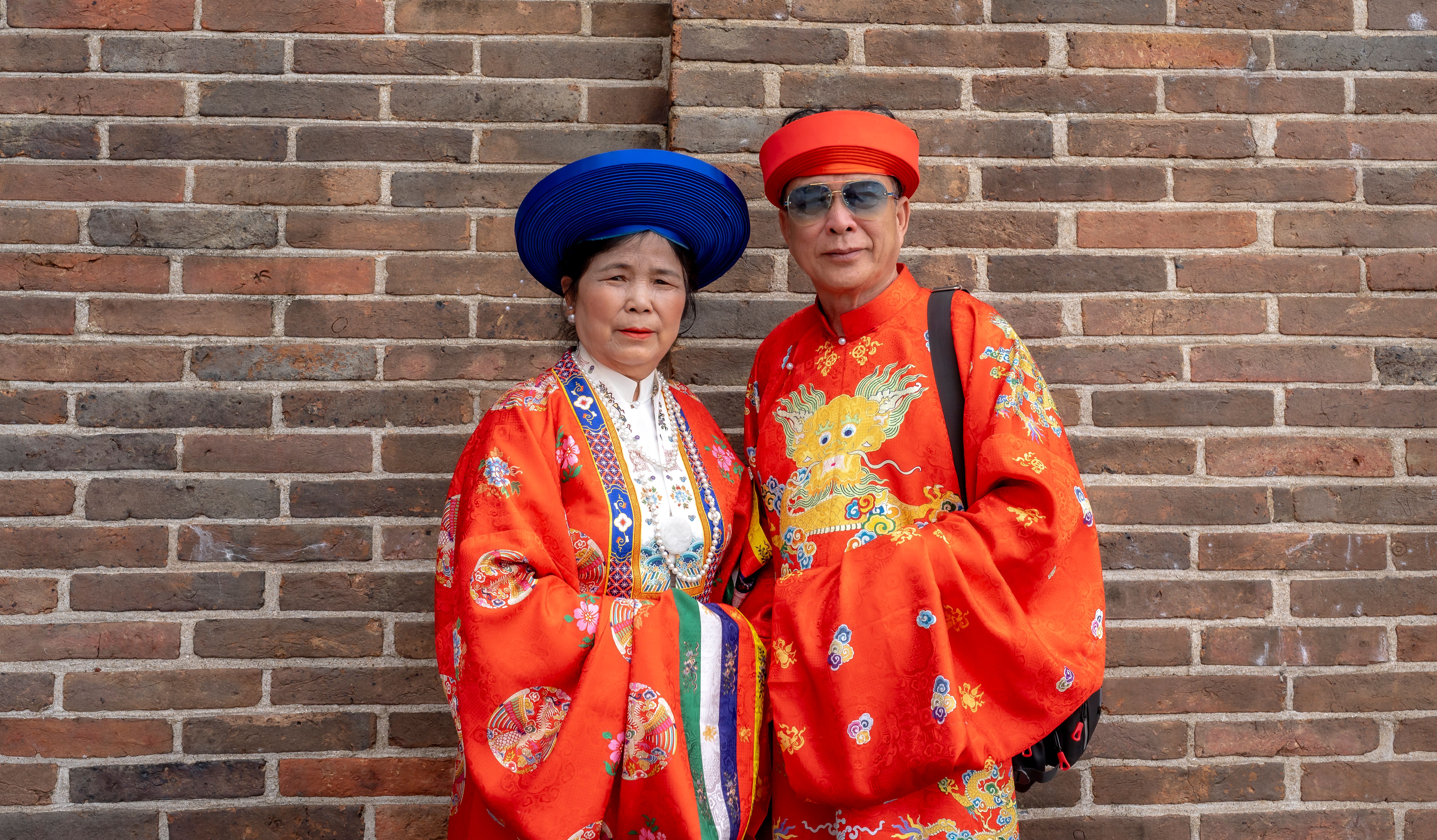 Couple In Traditional Vietnamese Attire Posing Free Stock Photo