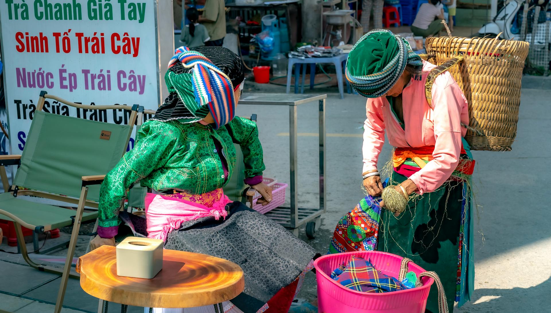 Hmong Women in Traditional Attire at Vietnamese Market