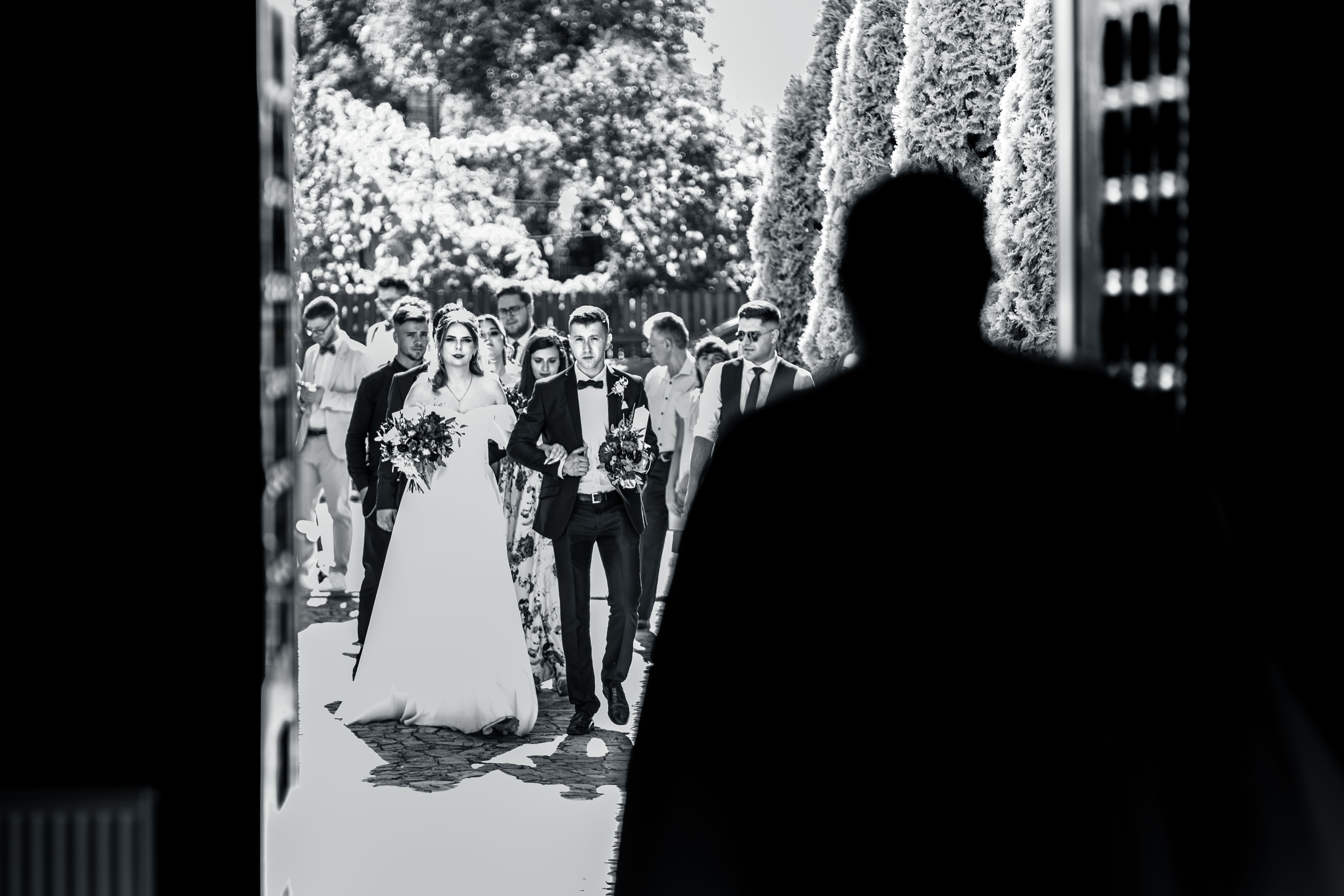 Black and White Wedding Procession Outdoors · Free Stock Photo