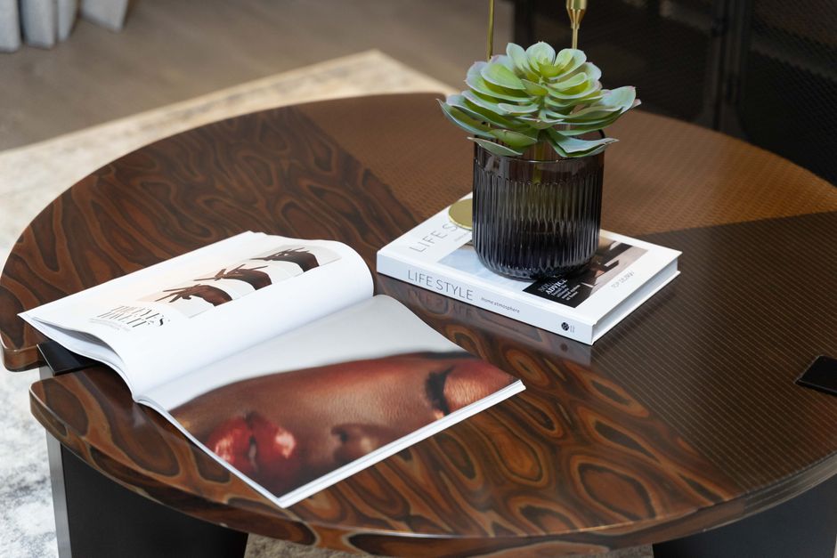 Stylish coffee table with a succulent and lifestyle magazines, perfect for modern interiors.