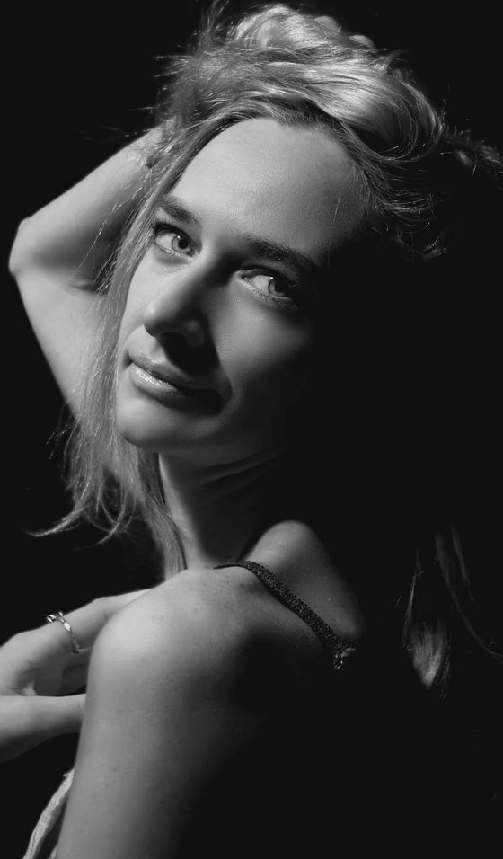 Black and white studio portrait by Alexander Krivitskiy on Pexels