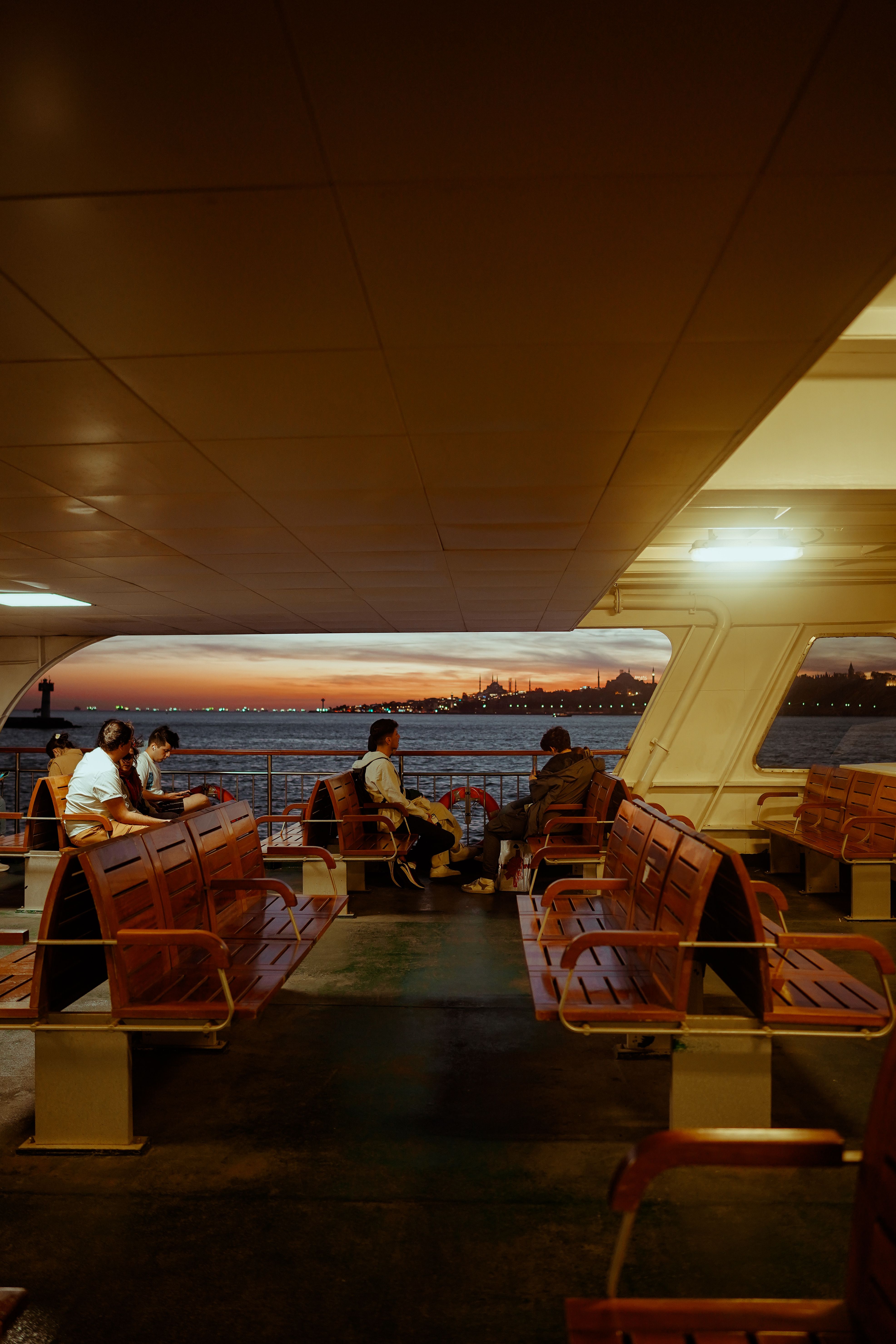 Serene Evening Ferry Ride in Istanbul · Free Stock Photo