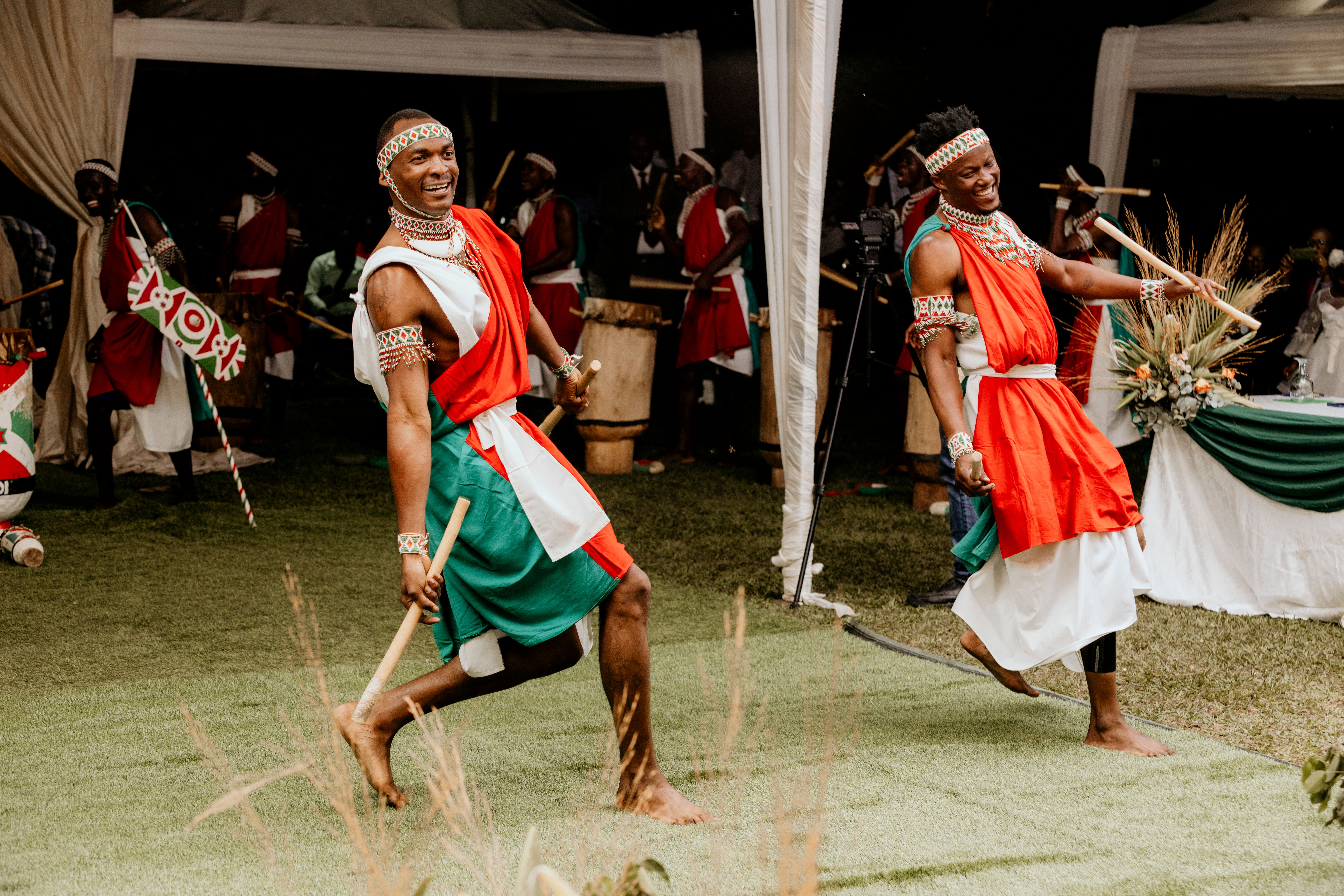 Vibrant African cultural dance with traditional costumes and joyful expressions.