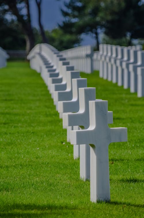 Free White crosses at Omaha Beach WWII Cemetery, Normandy, France, a tribute to fallen soldiers. Stock Photo
