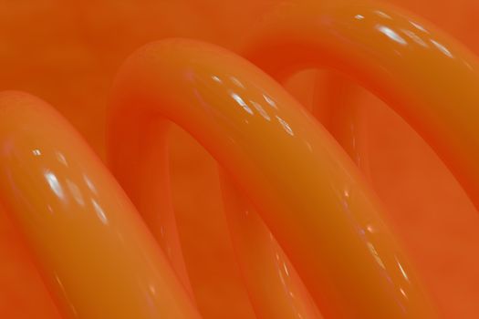 Vibrant abstract image featuring glossy orange spiral shapes on an orange background.
