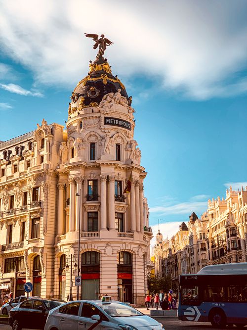 Free Stunning view of the iconic Metropolis building in Madrid, Spain, on a sunny day. Stock Photo