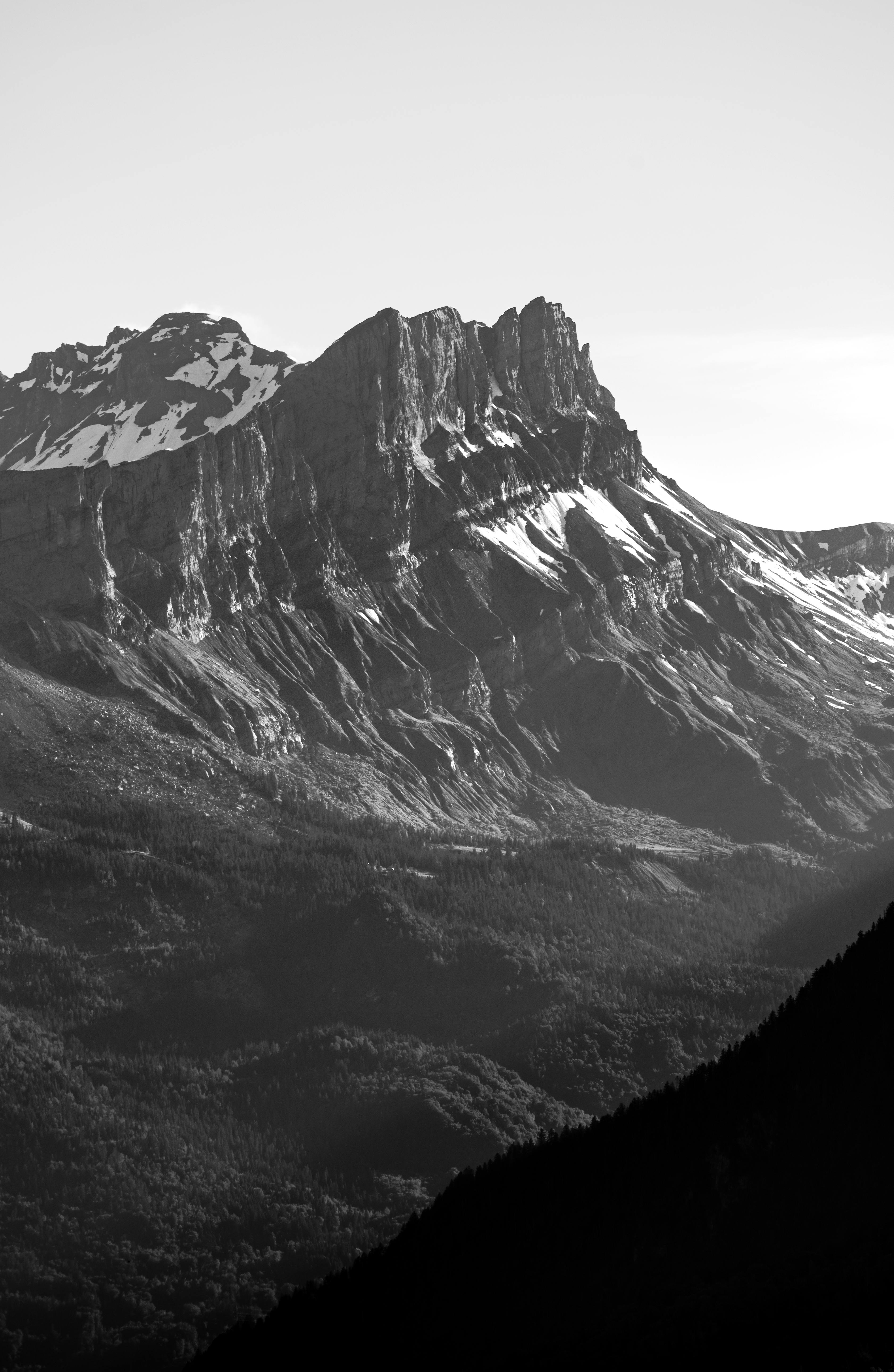 Black and white view of the majestic mountains in Chamonix, France.