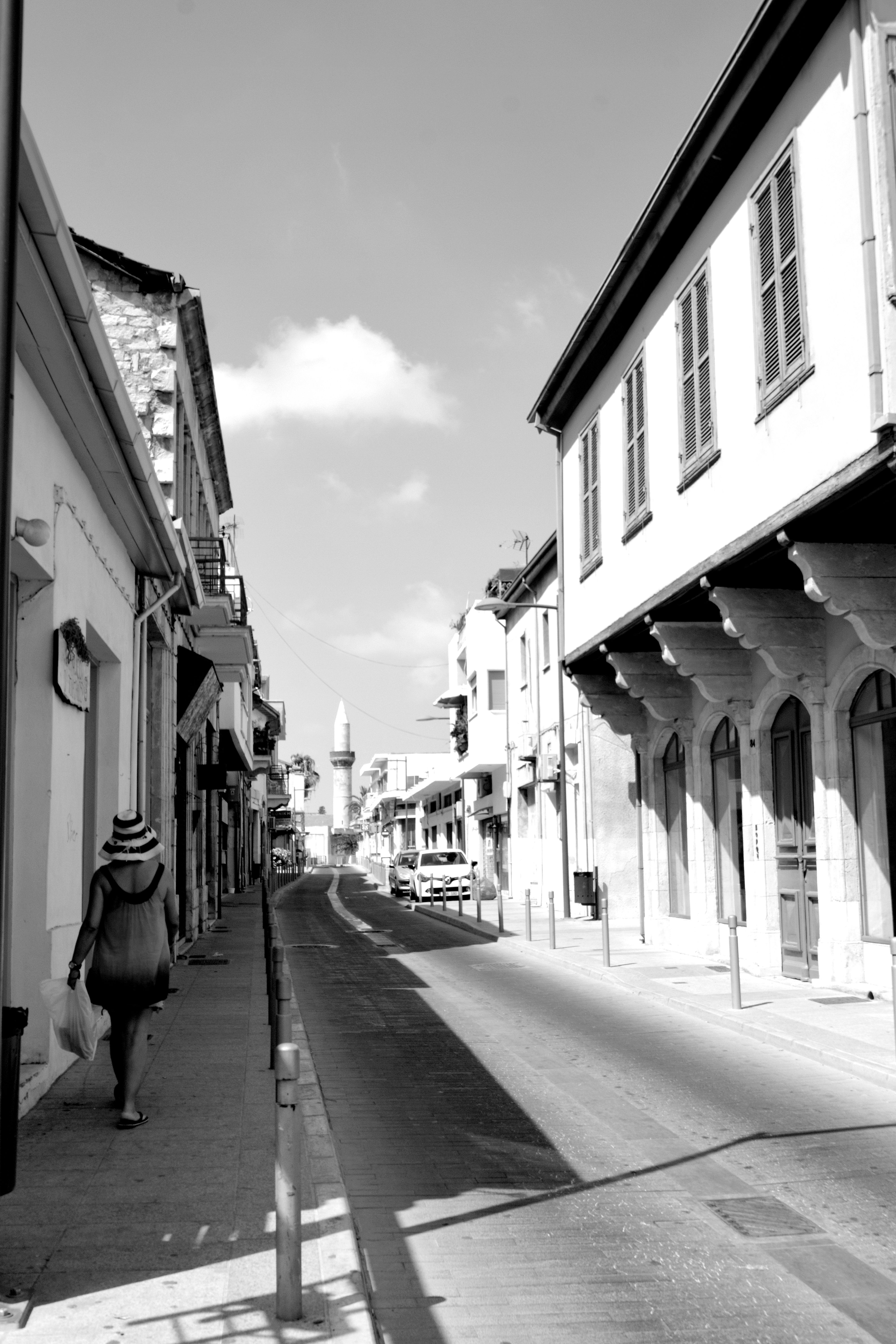 Black and White Urban Street Scene with Pedestrian · Free Stock Photo