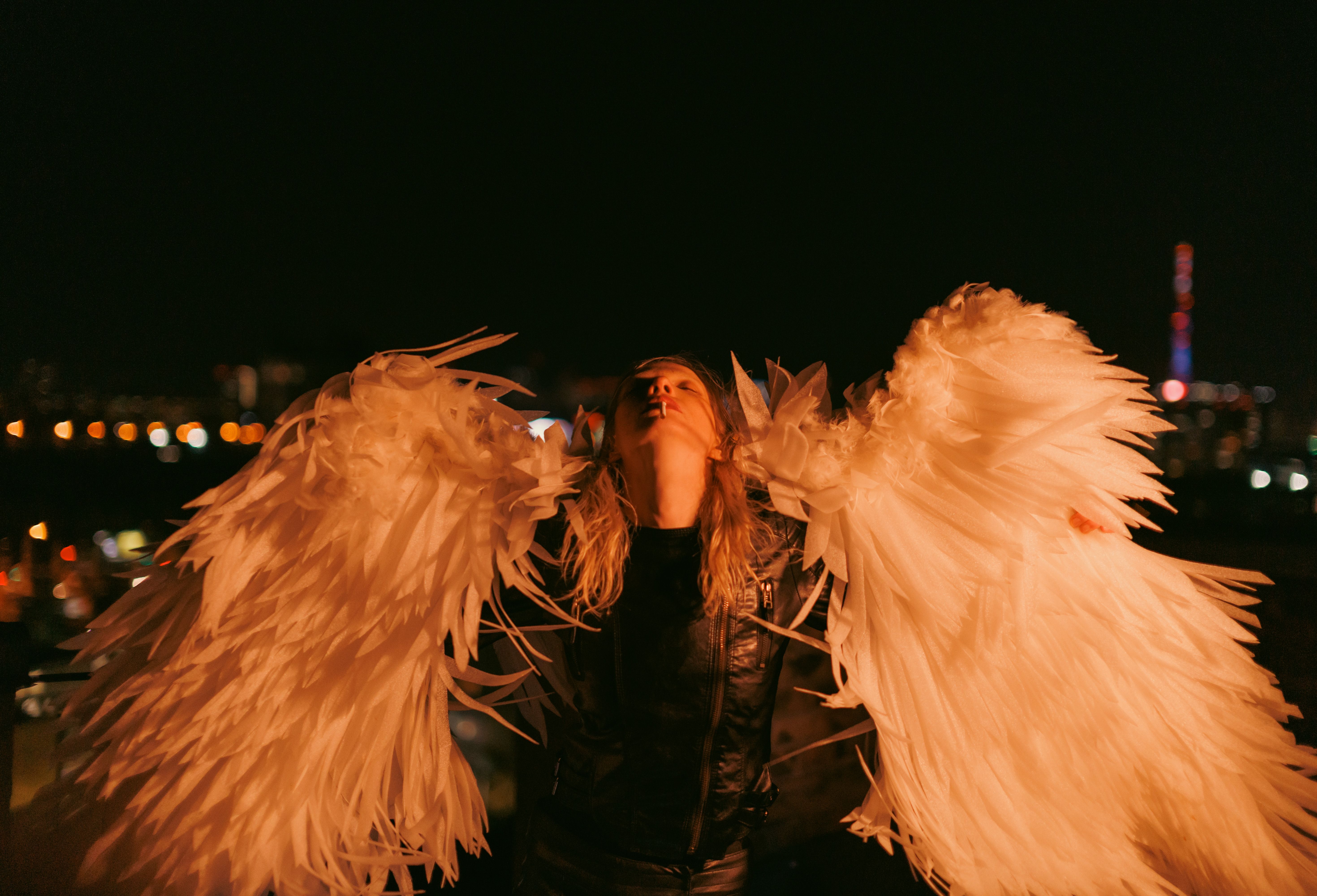 Dramatic Night Scene with Angel Wings · Free Stock Photo
