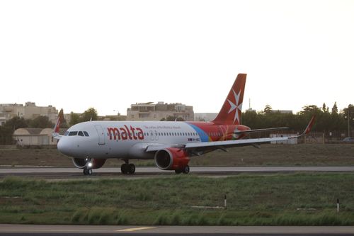 Free An Air Malta airplane on the runway at an airfield during daytime. Stock Photo