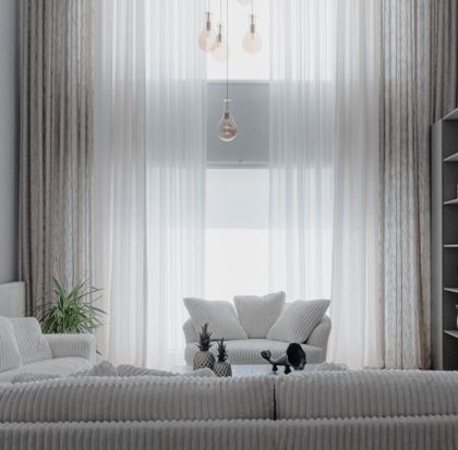 Minimalist living room with white sofas — photo by Beyza Kılıçdere on Pexels