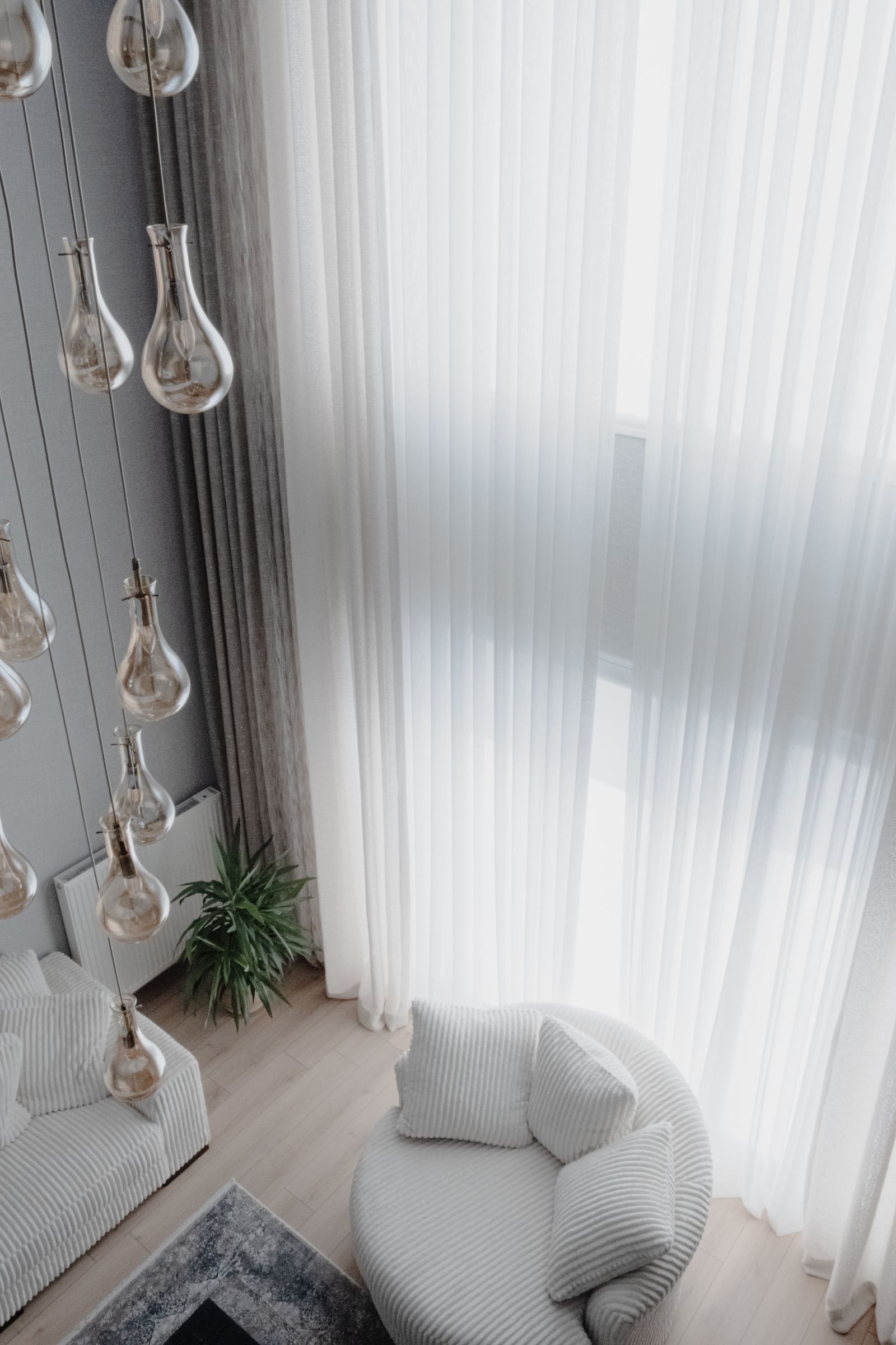 Airy living room with elegant curtains