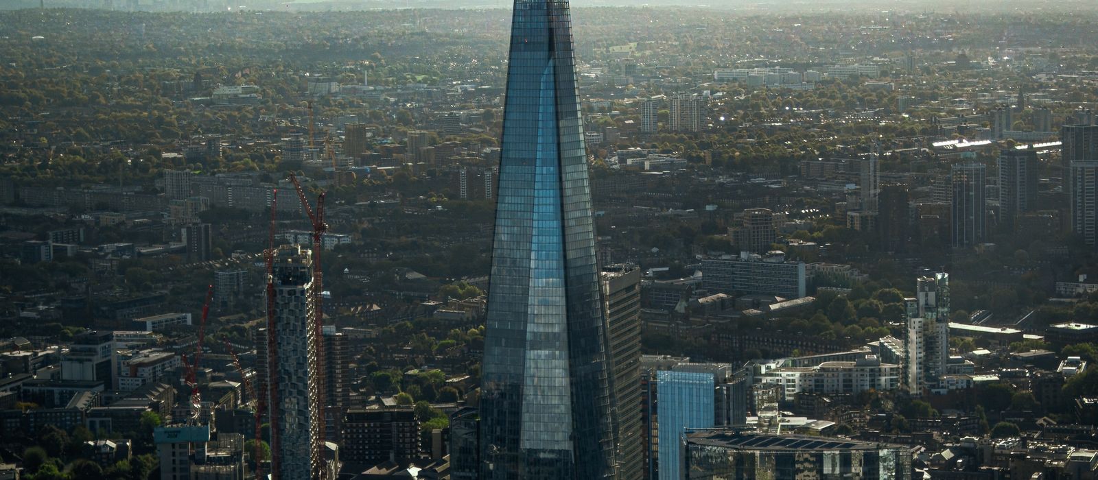 Stunning aerial view of The Shard, London's iconic skyline skyscraper during the day.