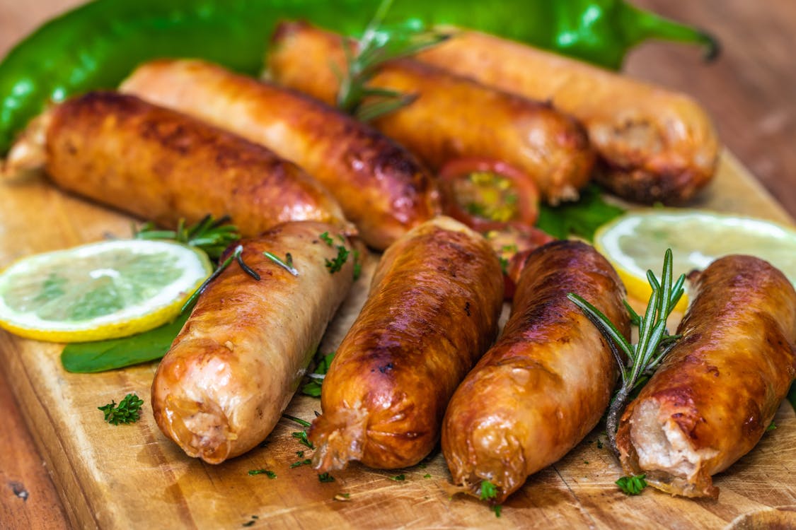 Free Cooked Sausages In Close-Up View Stock Photo
