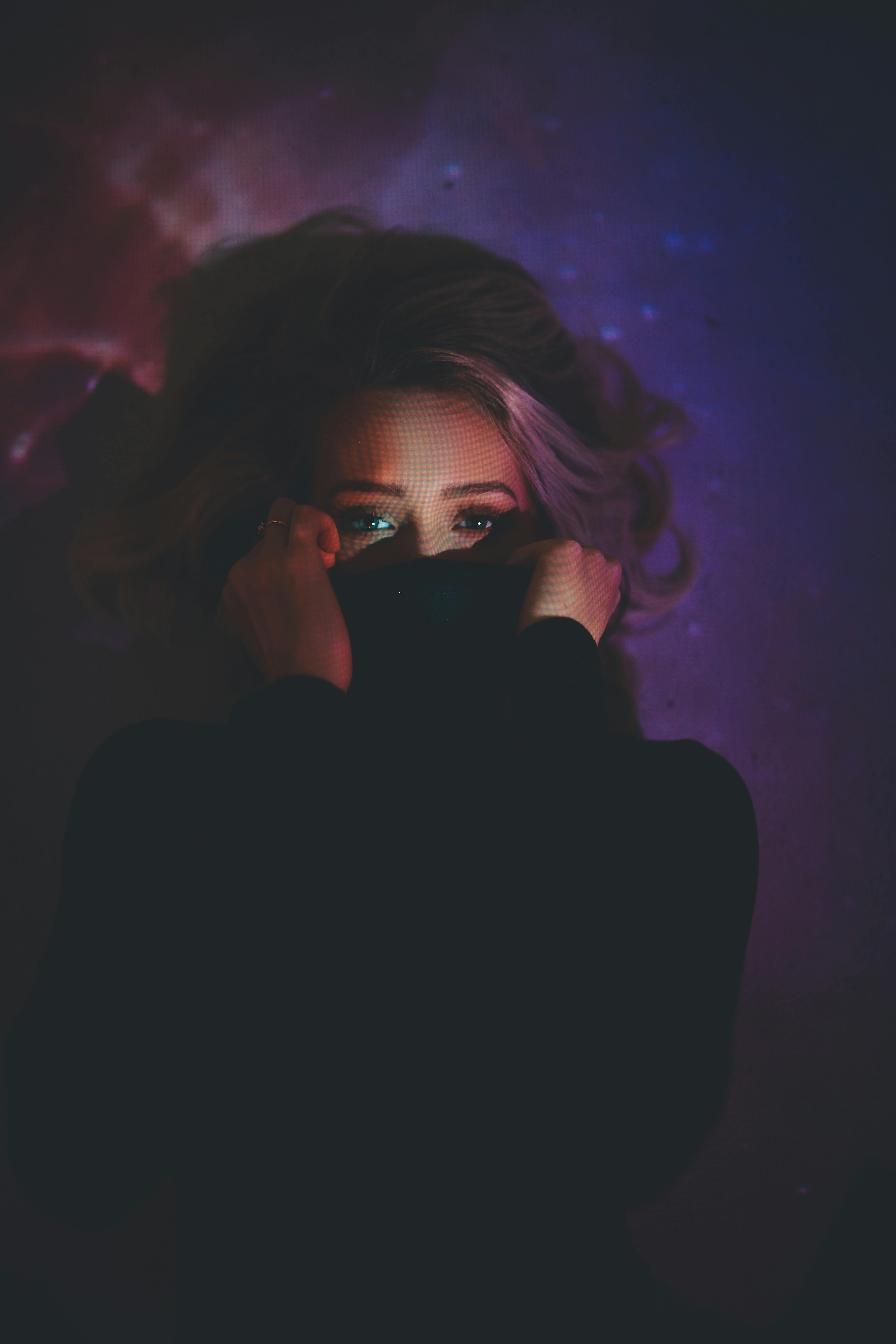 pexels-photo-2901916.jpeg?cs=srgbu0026dl=woman-covering-her-mouth-inside-dark-room-2901916.jpgu0026fm=jpg