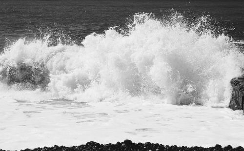 Free Black and white photo of powerful ocean waves crashing on the shore in Sochi, Russia. Stock Photo