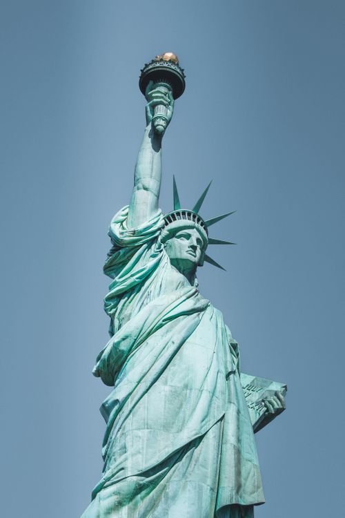 Free Iconic Statue of Liberty in New York, showcasing freedom and democracy. Stock Photo