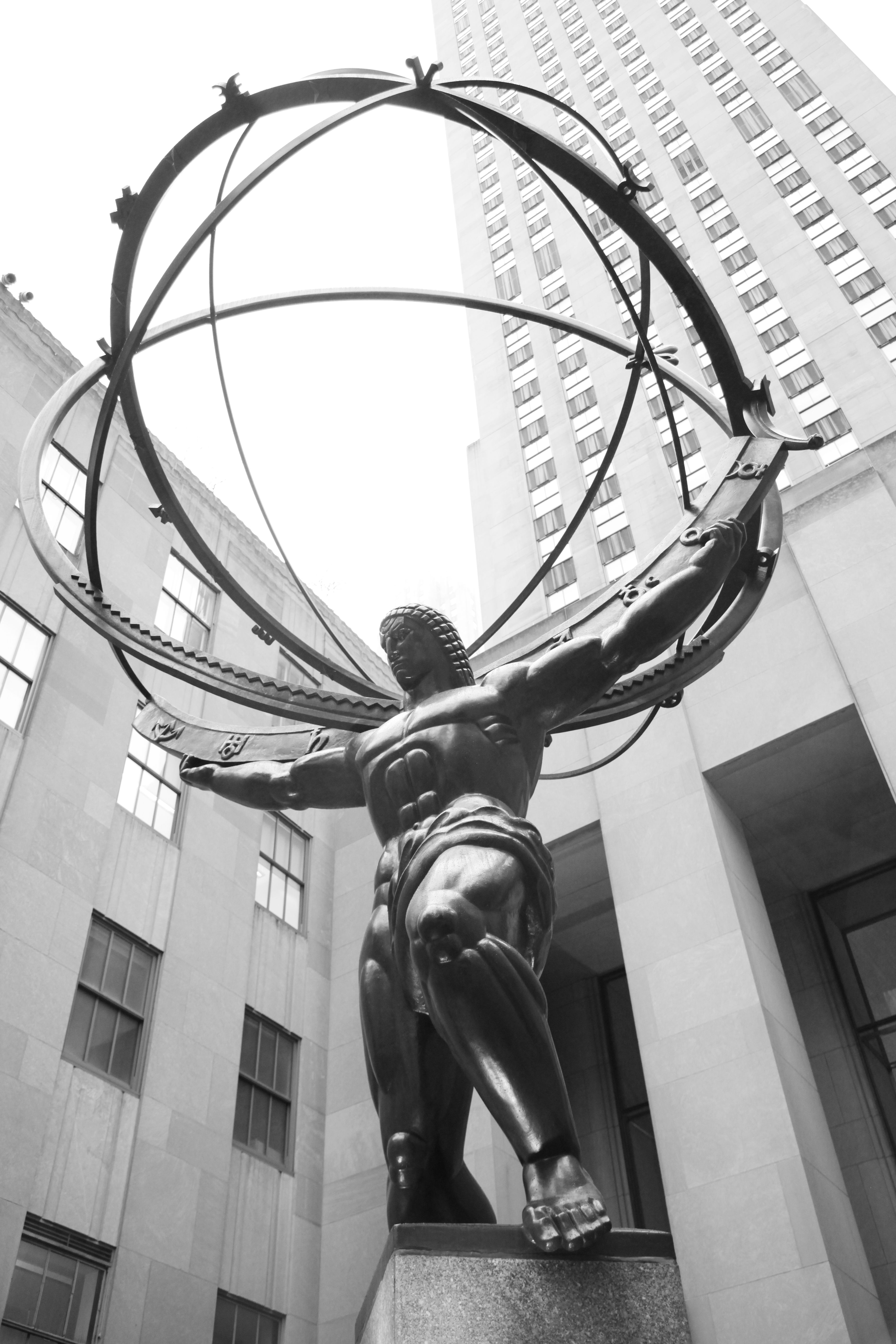 Iconic Atlas Statue holding the globe at Rockefeller Center, New York City.