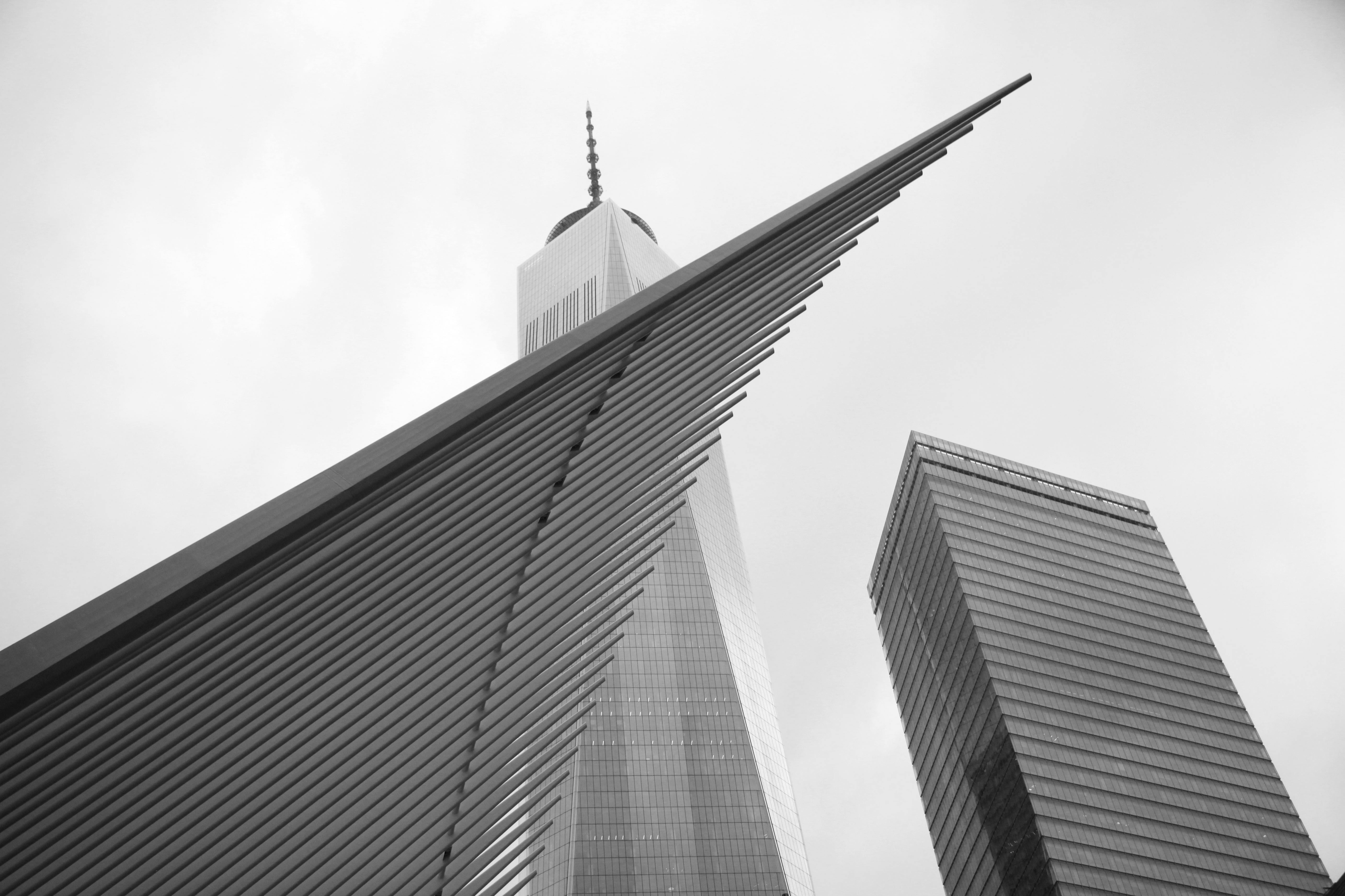 Black and white image of architectural landmarks in New York City, featuring the World Trade Center.