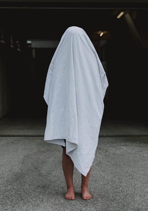 Free Person Covered with White Cloth Stock Photo