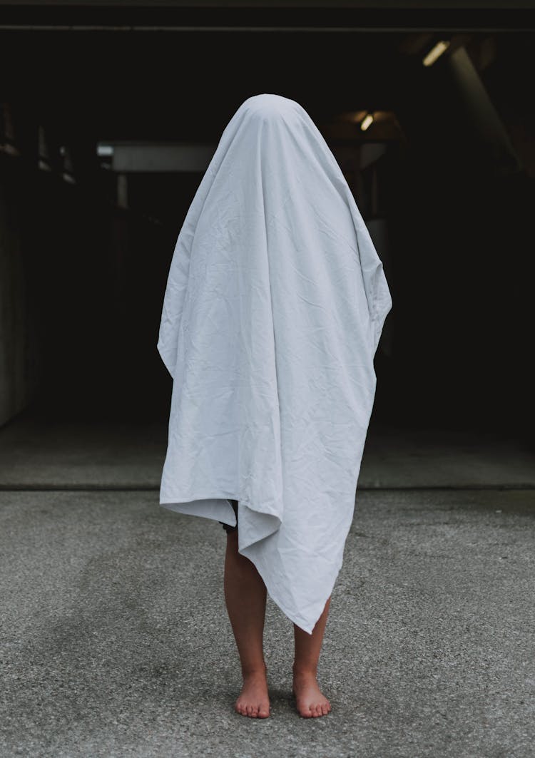 Person Covered With White Cloth