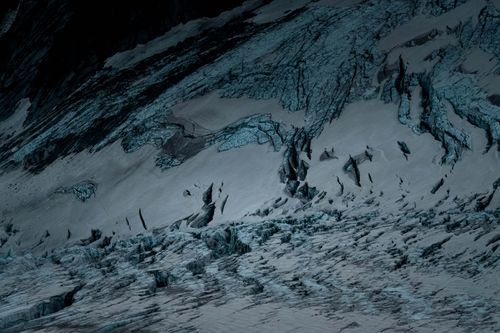Free A breathtaking view of a frozen glacier in Haute-Savoie, France, showcasing rugged ice formations. Stock Photo